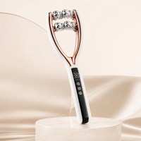 Adreluma facial sculpting roller with rose gold frame and metal massage balls